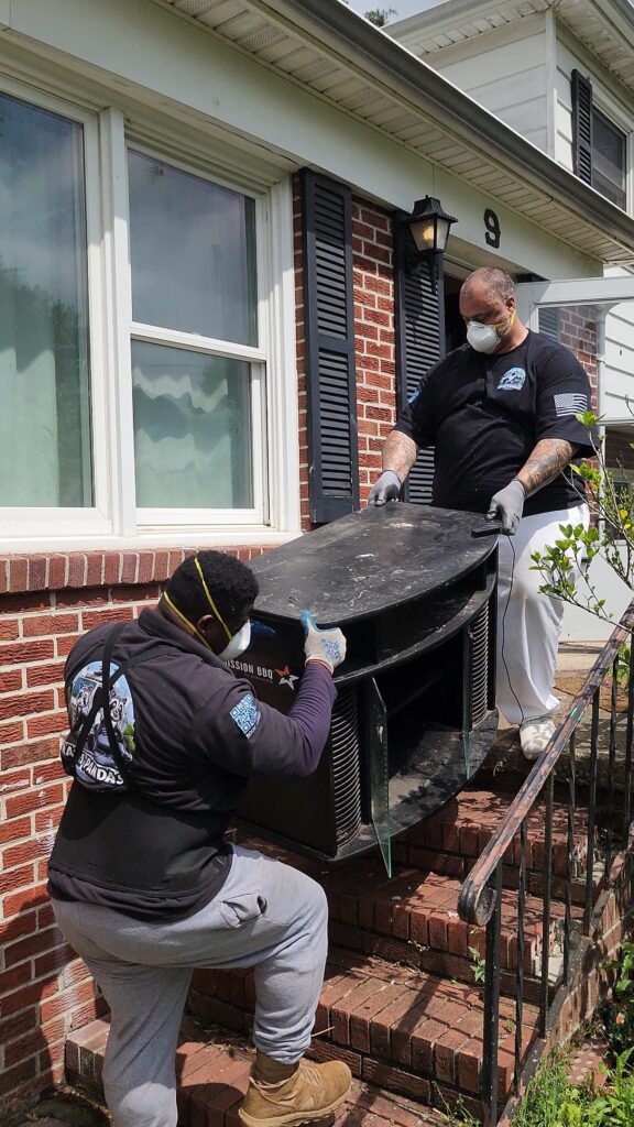 Trash Pandas removing furniture in Hampton